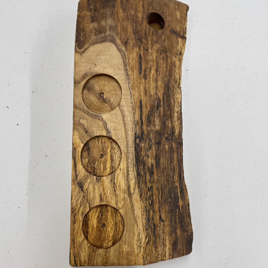 Top view of the Handmade spalted maple wooden tea light holder with holes for three frosted glass tea lights and a plant propagation tube. Top down view showing stunning grain patterns in the wood