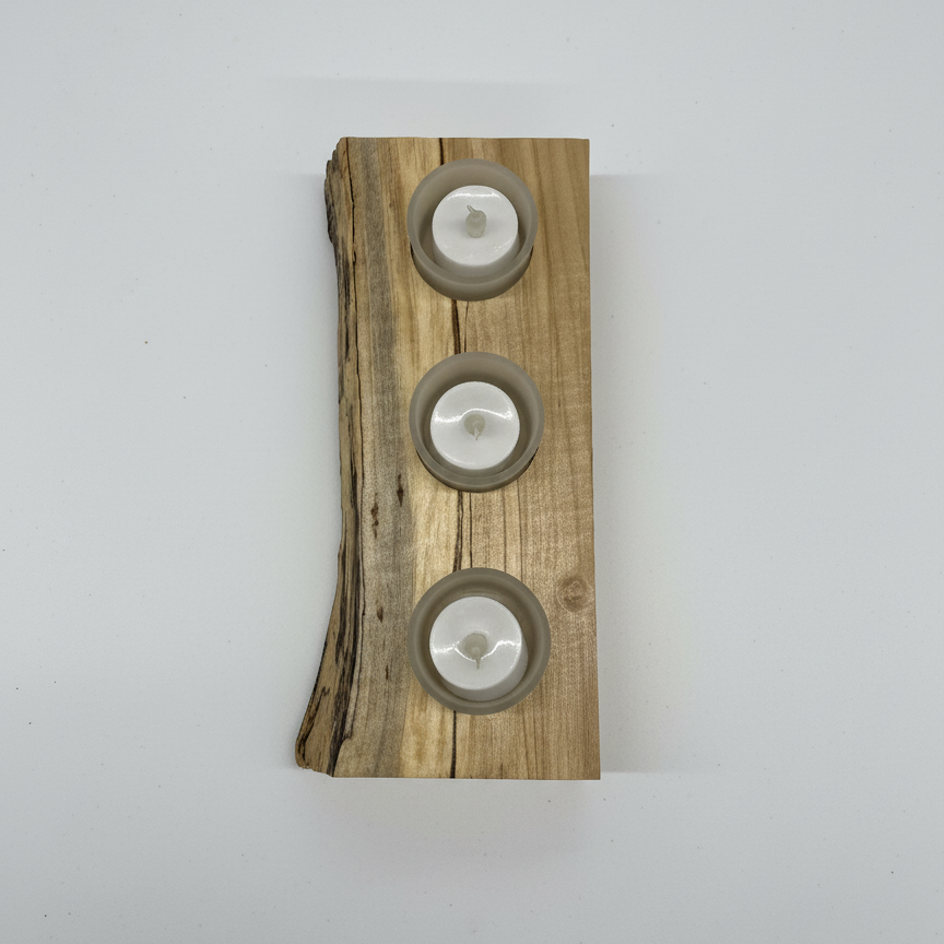 Top view of the Handmade spalted maple wooden tea light holder with holes for three frosted glass tea lights  Top down view showing stunning grain patterns in the wood