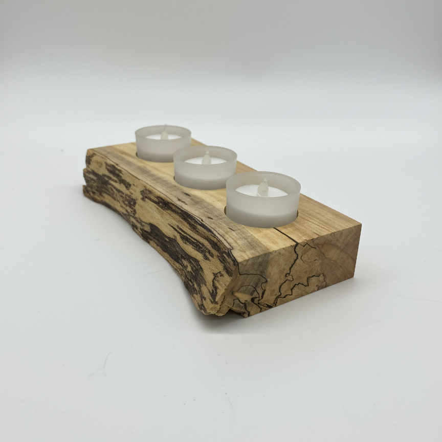 Handmade spalted maple wooden tea light holder with three frosted glass tea lights, opposite end view, amazing grain patterns