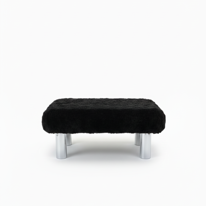Handcrafted footstool with plush black faux fur top and silver wood legs. On a white background. Made by Little Forest Studio.