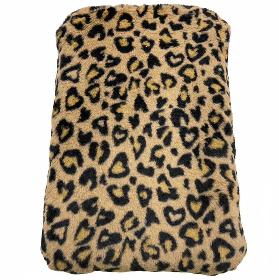 Handcrafted footstool top with plush cheetah print faux fur.   On a white background. Made by Little Forest Studio.