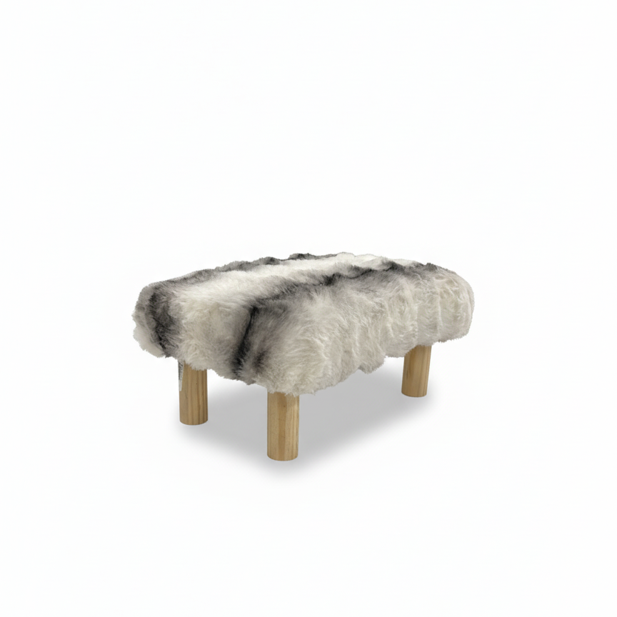 Handcrafted footstool with plush chinchilla print faux fur top and natural wood legs. On a white background. Made by Little Forest Studio.