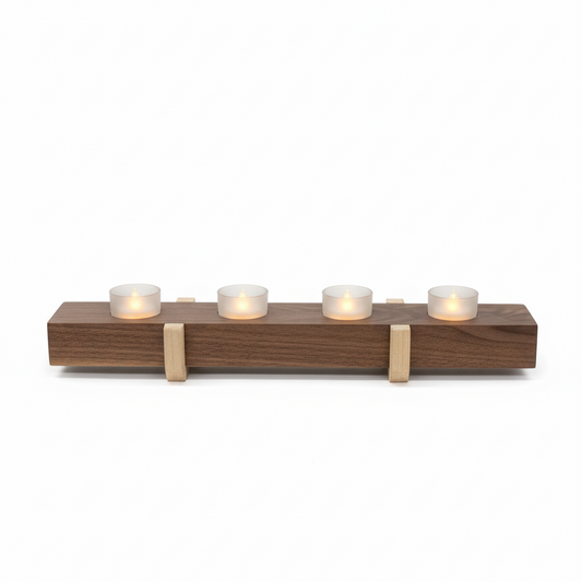Handmade walnut and maple wooden tea light holder with four frosted glass tea lights on risers – front view
